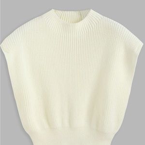 Brand new sleeveless sweater with high neck